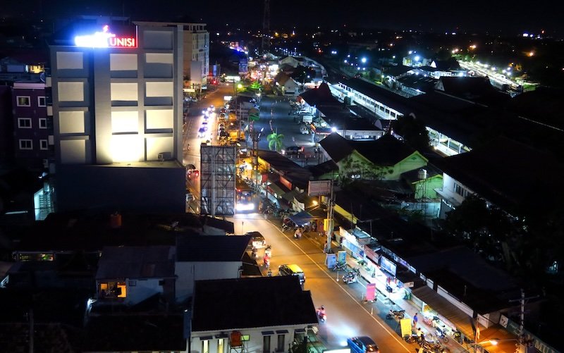 Nighttime views from our hotel room in Yogyakarta, Indonesia traffic from a high vantage point 