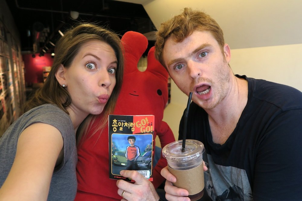 Nomadic Samuel and Audrey Bergner That Backpacker enjoying Korean cafe life with drinks in hand in Seoul, Korea Nomadic Samuel and Audrey Bergner That Backpacker enjoying Korean cafe life with drinks in hand in Seoul, Korea