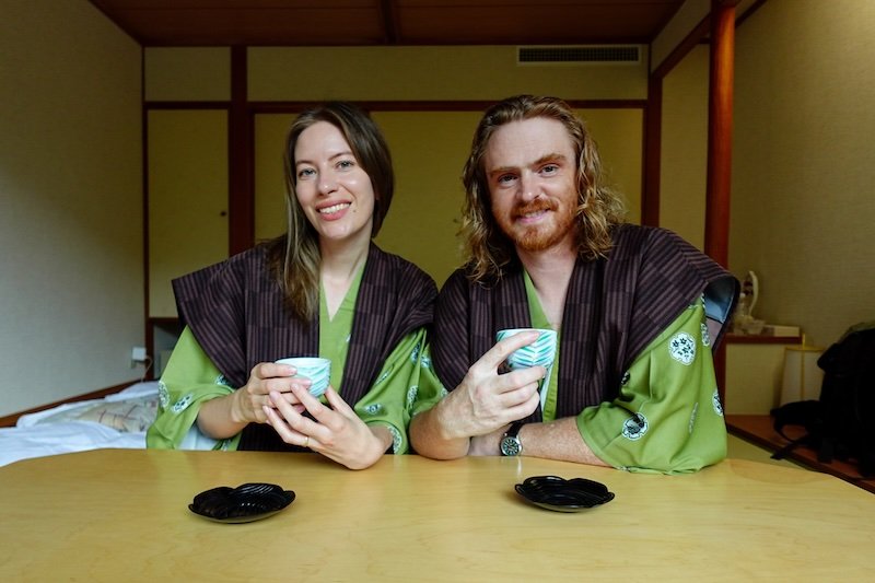 Nomadic Samuel and Audrey Bergner That Backpacker wearing Japanese robes and drinking tea at a ryokan in Noboribetsu Onsen, Hokkaido, Japan Nomadic Samuel and Audrey Bergner That Backpacker wearing Japanese robes and drinking tea at a ryokan in Noboribetsu Onsen, Hokkaido, Japan