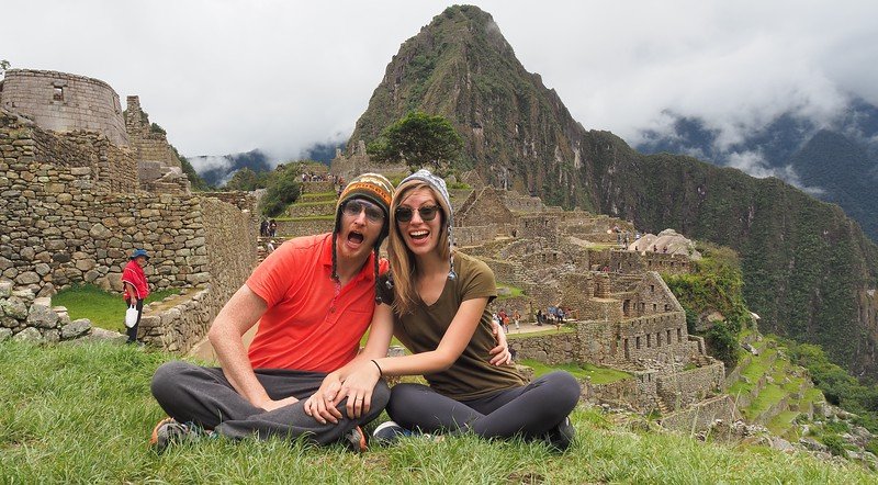 Nomadic Samuel and Audrey Bergner Visiting Machu Picchu and loving every second of it wearing traditional Peruvian hats and big smiles! 
