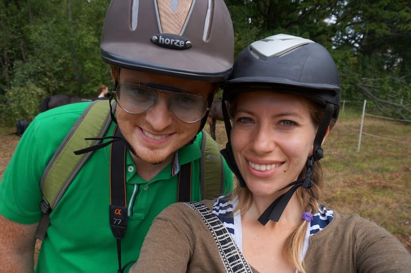 Nomadic Samuel and That Backpacker Audrey Bergner riding horses together in Finland 