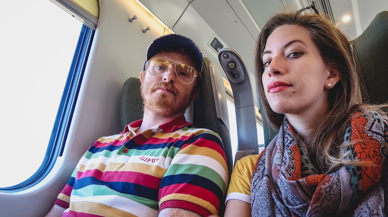 Nomadic Samuel and That Backpacker Audrey Bergner taking the local train from Gdansk to Malbork castle in Poland 