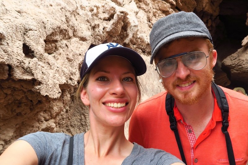 Travel bloggers Nomadic Samuel and Audrey Bergner from That Backpacker taking a selfie inside the rocky formations of Valley of the Moon in the Atacama Desert, Chile