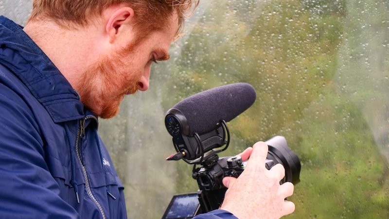 Nomadic Samuel capturing cinematic moments on a cable car whilst traveling in Germany 