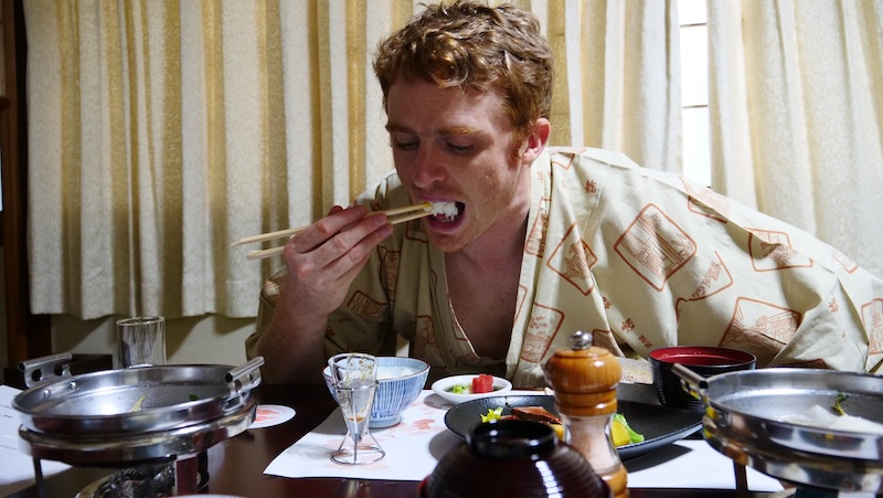 Nomadic Samuel eating rice during his ryokan stay in Takayama, Japan Nomadic Samuel eating rice during his ryokan stay in Takayama, Japan
