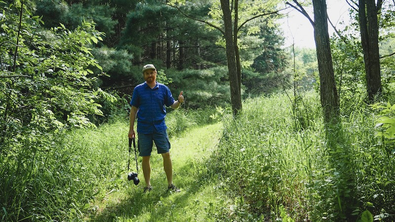Nomadic Samuel enjoying hiking trails and photography at the off-grid cabin in Schomberg, Ontario 