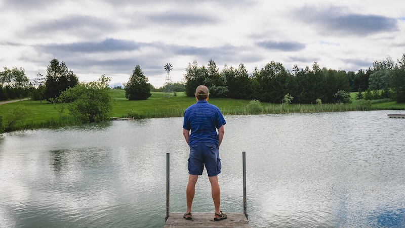 Nomadic Samuel enjoying the pond views off-grid in Ontario 