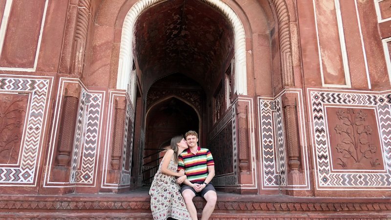 Nomadic Samuel getting a kiss from Audrey Bergner That Backpacker at the Taj Mahal in Agra, India 