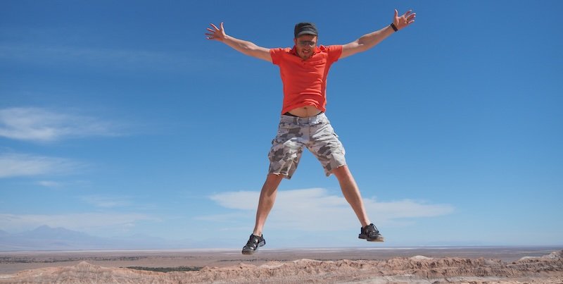 Nomadic Samuel jumping with joy against the dramatic desert landscapes of Valle de la Luna in Chile’s Atacama Desert Nomadic Samuel jumping with joy against the dramatic desert landscapes of Valle de la Luna in Chile’s Atacama Desert