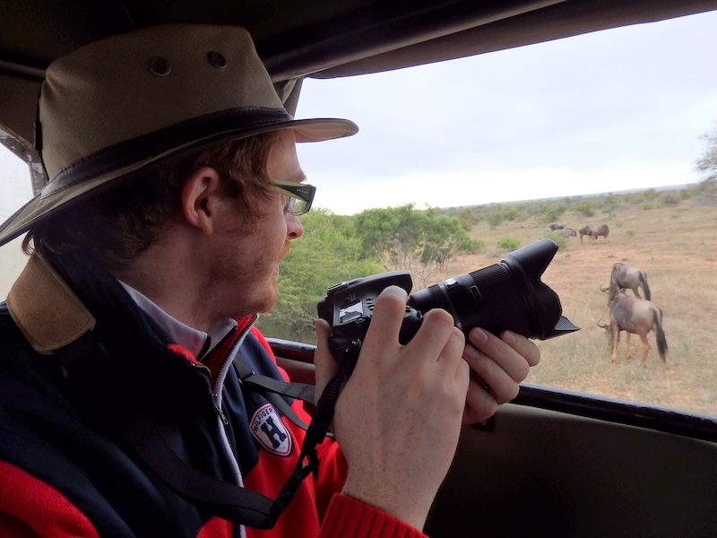 Nomadic Samuel on safari in Kruger National Park taking photos with glee of wildlife Nomadic Samuel on safari in Kruger National Park taking photos with glee of wildlife