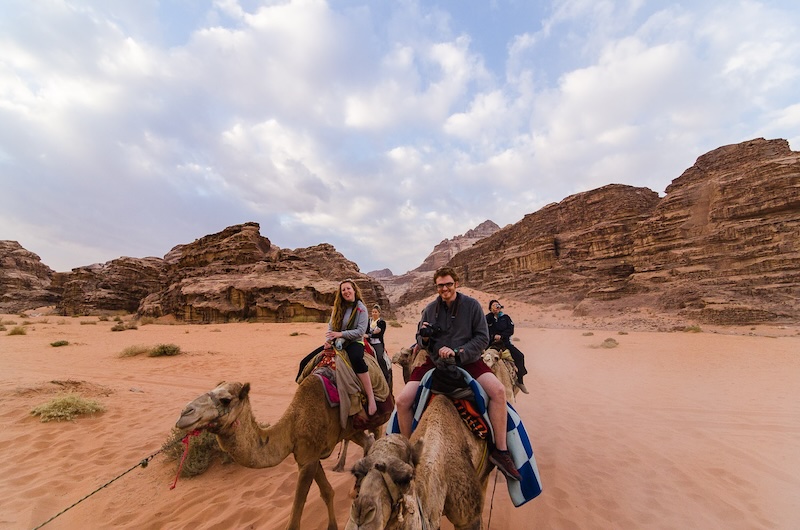 Nomadic Samuel riding a camel in Wadi Rum, Jordan 