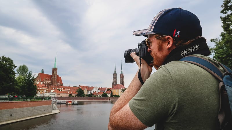 Nomadic Samuel taking photos of Cathedral Island in Wroclaw, Poland Nomadic Samuel taking photos of Cathedral Island in Wroclaw, Poland