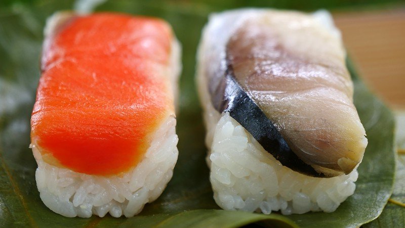 One food to try as a street snack in Nara is Persimmon Leaf Sushi that comes beautifully wrapped and with thick slices of fish on top of rice in Japan One food to try as a street snack in Nara is Persimmon Leaf Sushi that comes beautifully wrapped and with thick slices of fish on top of rice in Japan