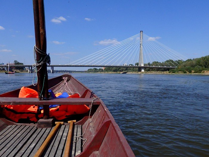 One of the best things to do in Warsaw in summer is to take a boat tour on the Vistula River to enjoy distinct city views and natural scenery in Poland