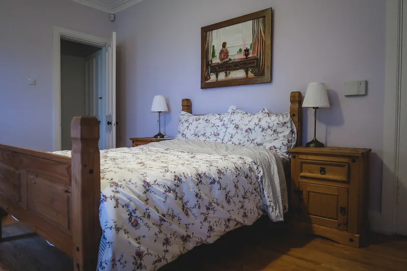 Our AirBnB in Innellan during the Cowal Games featuring a nice cozy room with comfortable rustic bed 