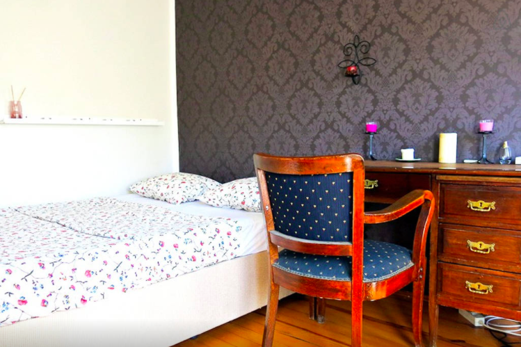 Our airbnb studio in Istanbul turkey with a work desk right next to our bed allowing us to sleep and be productive all in the same space 