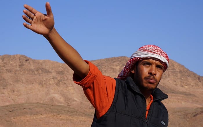 Our guide showing us around with hand gestures at the Fenyan Ecolodge in Jordan