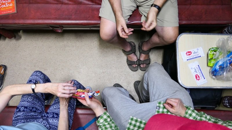 Overhead view of riding the train and eating snacks in India going from Delhi to Jasailmer 