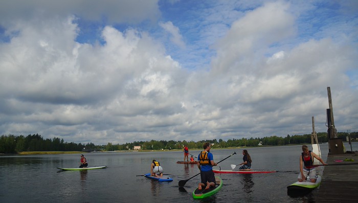 Paddleboarding in Finland is the perfect summer adventure activity for exercise and relaxation 