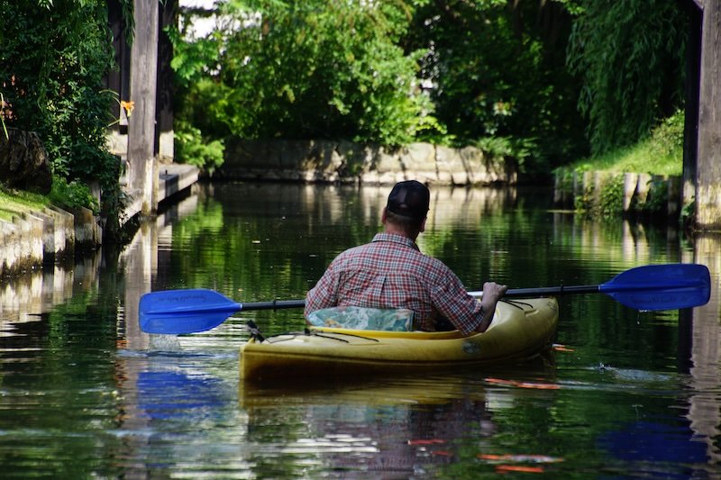 Paddling down the canals in Spreewald, Germany Paddling down the canals in Spreewald, Germany