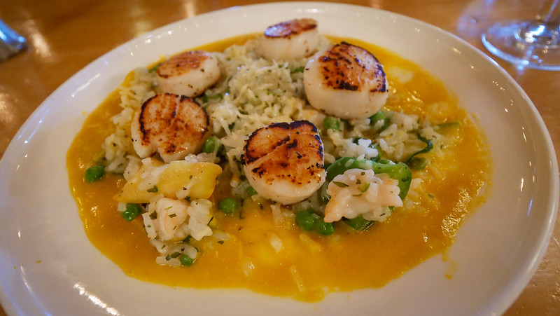 Pan-seared scallops served with a pea and lobster risotto was such a decadent meal on our trip to Southern Cape Breton