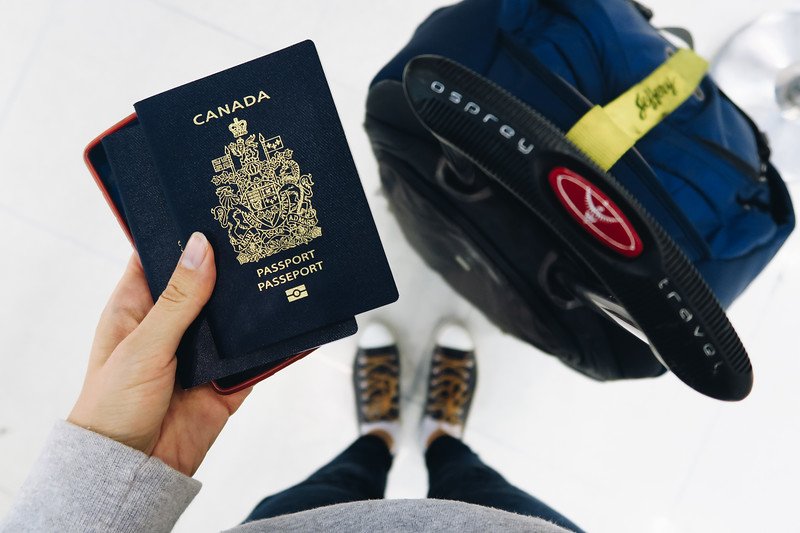 Passport, backpack and ticket in hand ready to volunteer abroad as a teenager 