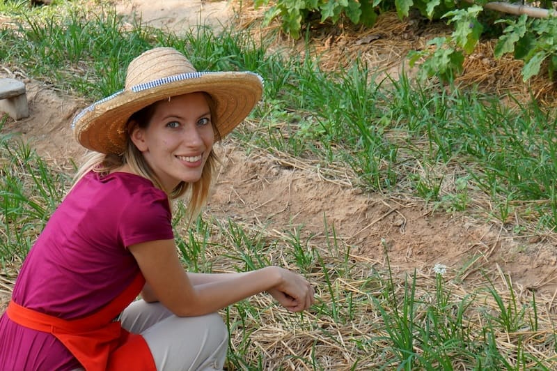 Picking local Thai ingredients from the farm to make Thai food as highlighted by Audrey Bergner That Backpacker 