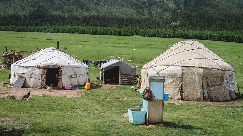 Picking up horses from the yurt camp for the Shatyly day trek in a rural and rustic area in Kyrgyzstan 