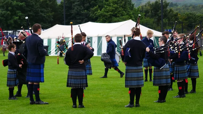 Piping bands getting ready to compete at the Highland games in Scotland 