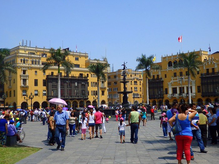 Plaza de Armas in Lima, Peru where you find colonial buildings in the heart of the cities historic centre with loads of pedestrians and tourists visiting on any given day