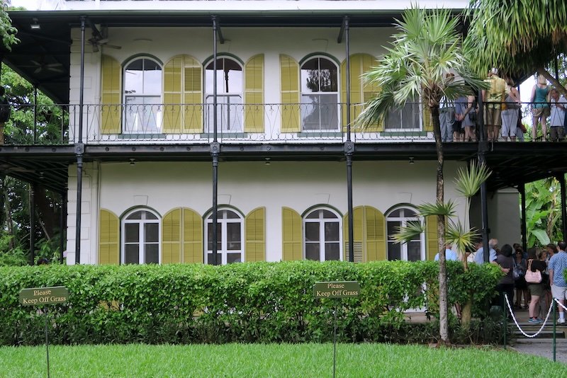 Please keep off the grass at the Hemingway house tour visiting Key West, Florida 
