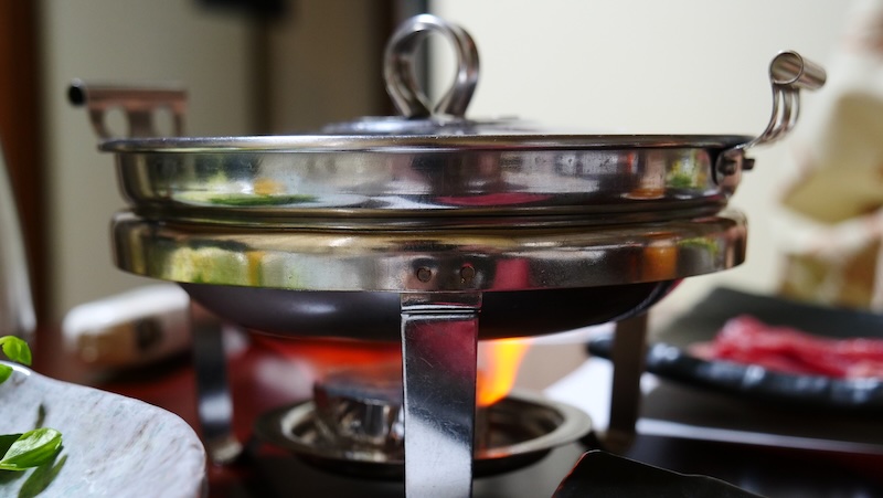 Pot cooking over flame at our Ryokan in Takayama, Japan Pot cooking over flame at our Ryokan in Takayama, Japan