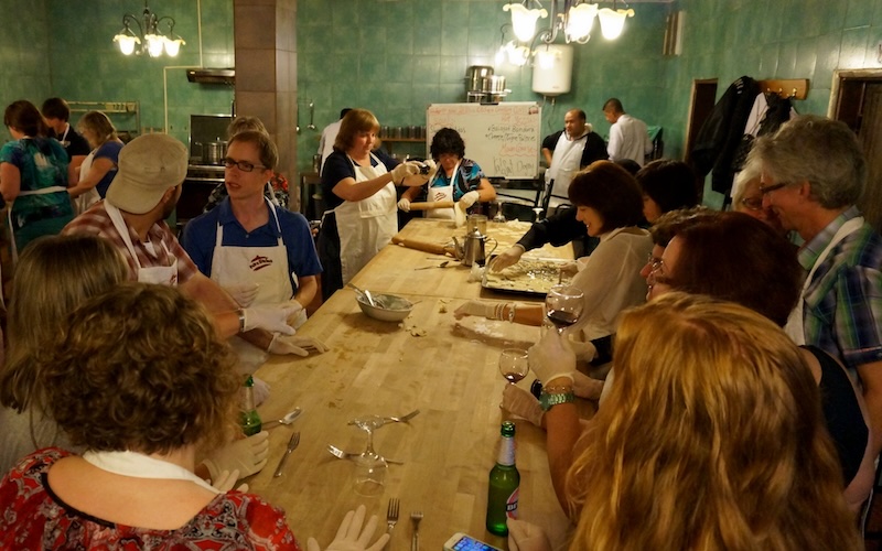 Preparing and enjoying a communal meal together in Petra, Jordan 