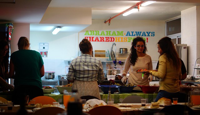 Preparing Shabbat dinner at Abraham Hostel Jerusalem, Israel was a cultural, social and foodie highlight from our entire time staying there