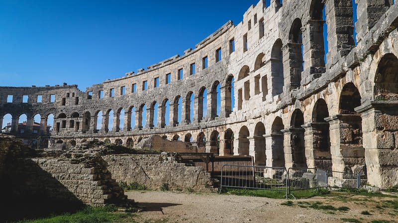 Pula Arena an impressive Roman amphitheatre in the centre of the city showcasing its grand scale 