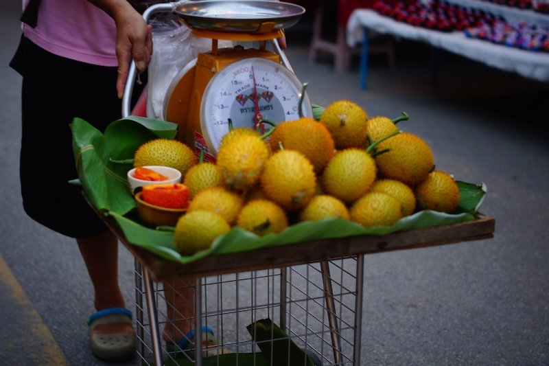 Pushcart with Thai fruit at the Chiang Mai Saturday Night Market in Thailand 