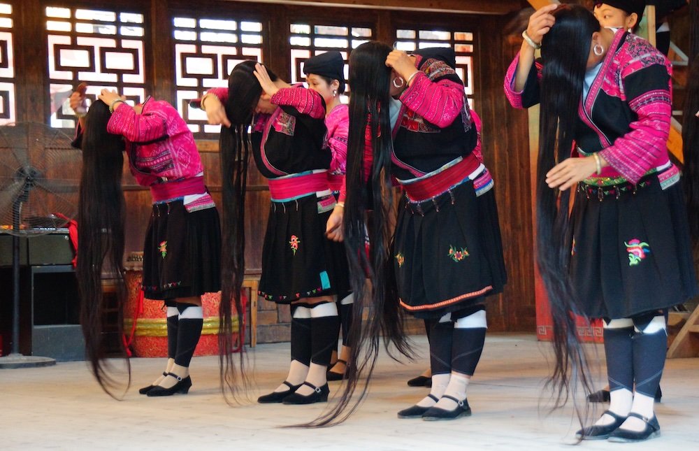 Red Yao long hair performance on a day trip from Guilin to Longji in China 