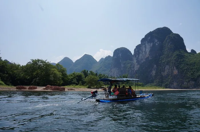 Riverboat views of the Li River with Karst mountains in the background