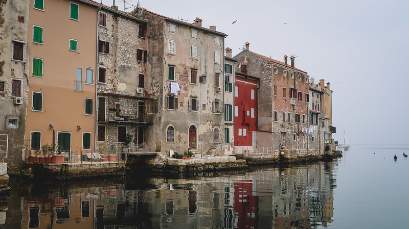 Rovinj was part of the Venetian Empire, so parts of it look like Venice such as these buildings overlooking the waterfront in Croatia 