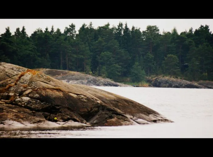 Rugged coastal scenery featuring rocky shores kayaking trip in the Archipelago Sea in Finland 