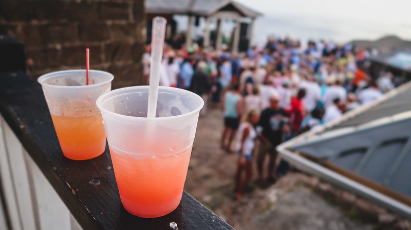 Rum punch and live music at the Sunday Party in Antigua with a big crowd out for the party Rum punch and live music at the Sunday Party in Antigua with a big crowd out for the party