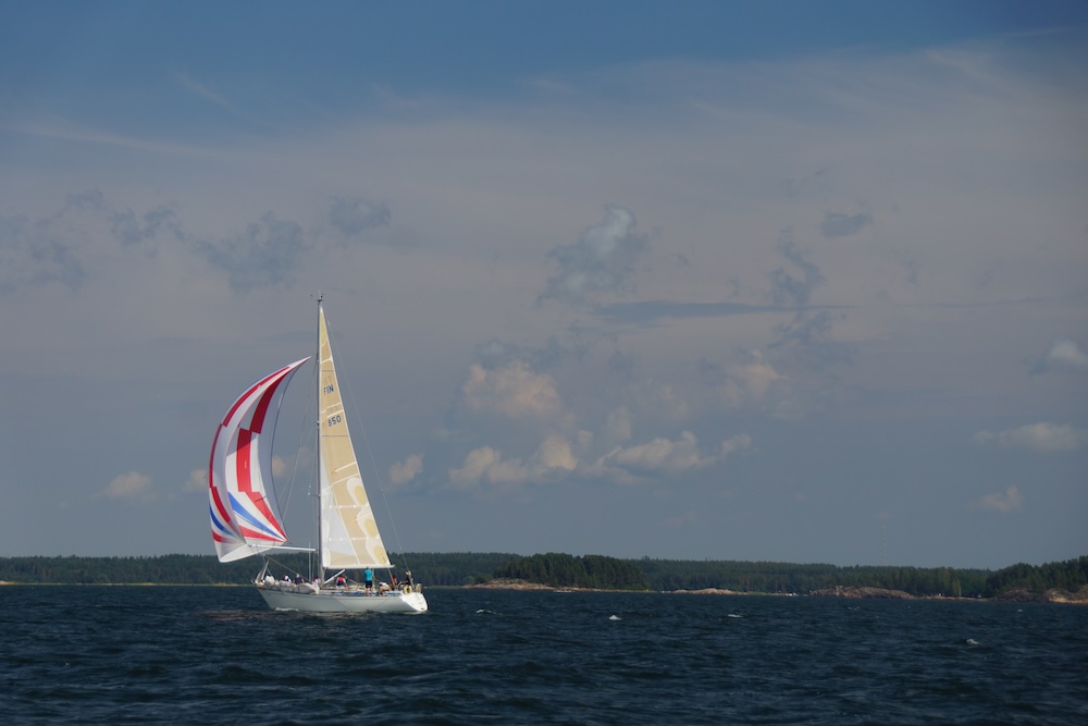Sailboat sailing on the open waters of the Finnish Archipelago in Finland 
