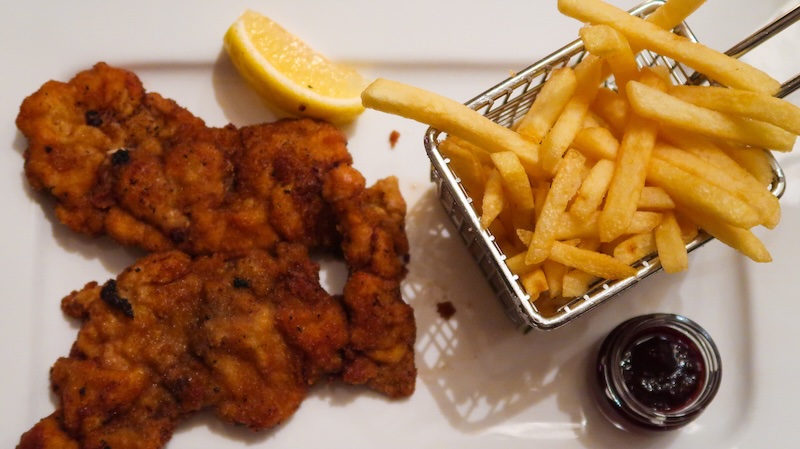Schnitzel and fries served as a meal whilst visiting Tirol, Austria 