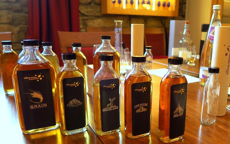 Blending whiskies during a tasting session at the Scotch Whisky Experience in Edinburgh, Scotland with grain, Lowland, Highland, Speyside, and Islay samples