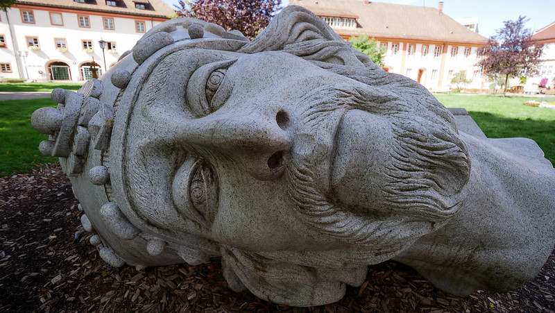 Sculpture of St Blasius in Sankt Blasien, Germany lying horizontally on the ground 