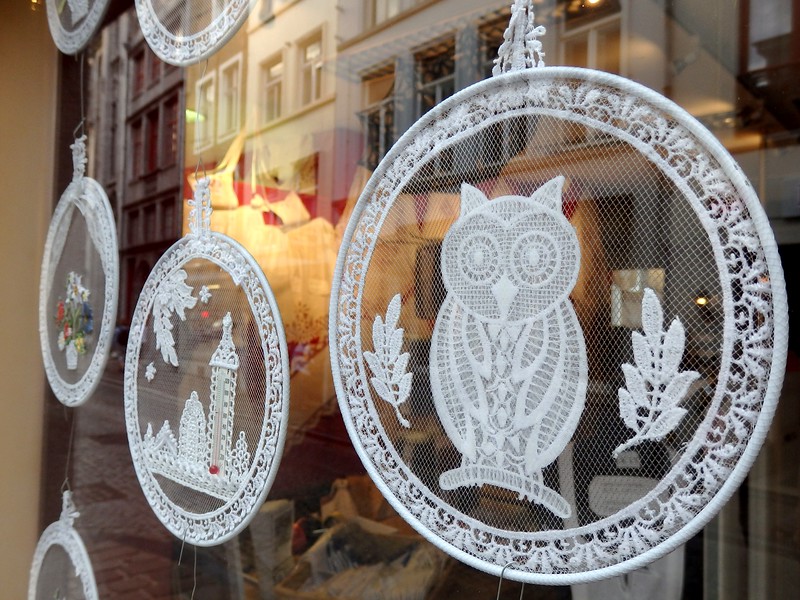 Shop for Belgian lace owl patterns and other designs is one of the many things to do in Bruges, Belgium Shop for Belgian lace owl patterns and other designs is one of the many things to do in Bruges, Belgium