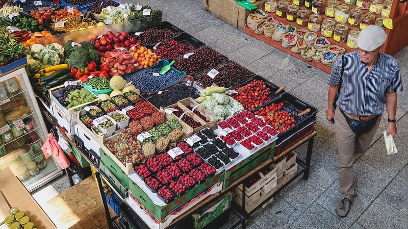 Shopping for fresh ingredients in Wroclaw including colorful berries on display Shopping for fresh ingredients in Wroclaw including colorful berries on display