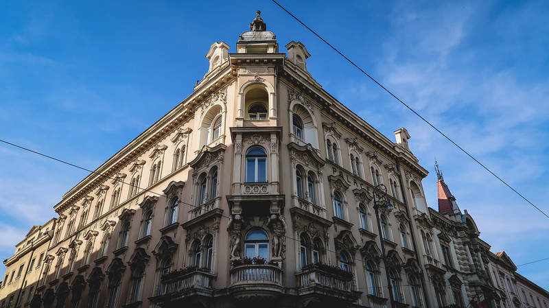 Sightseeing in Zagreb with distinct architecture from a low angle vantage point showing how grand and ornate buildings can be in the capital city of Croatia