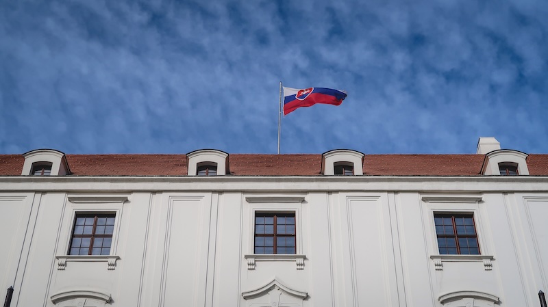 Slovakia flag flapping at the top of the building in Bratislava, Slovakia Slovakia flag flapping at the top of the building in Bratislava, Slovakia