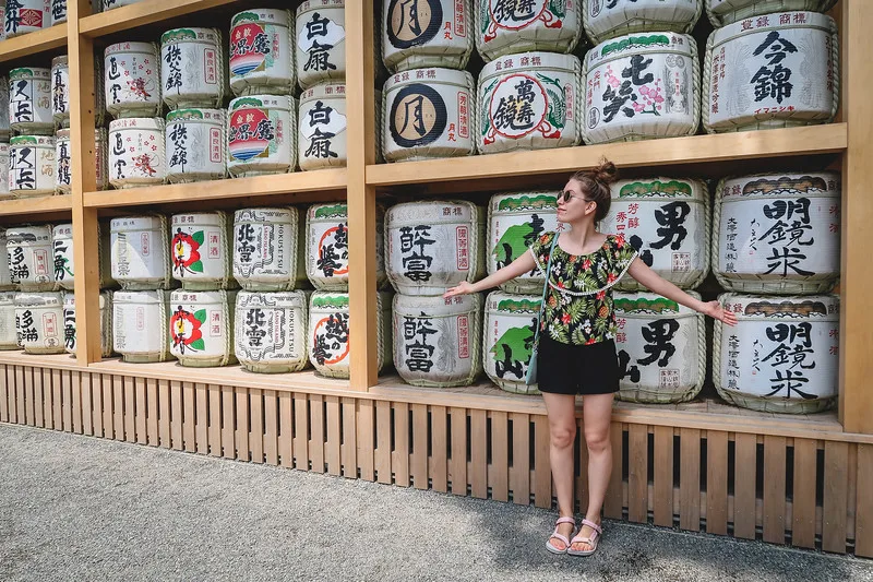 Some of the pros of visiting Japan in summer are the number of festivals and events that take place. That Backpacker posing by sake bottles in Japan. Some of the pros of visiting Japan in summer are the number of festivals and events that take place. That Backpacker posing by sake bottles in Japan.